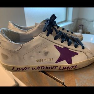 Super-Star in leather w/ "Love without limits"